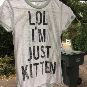 See-through short sleeve shirt.